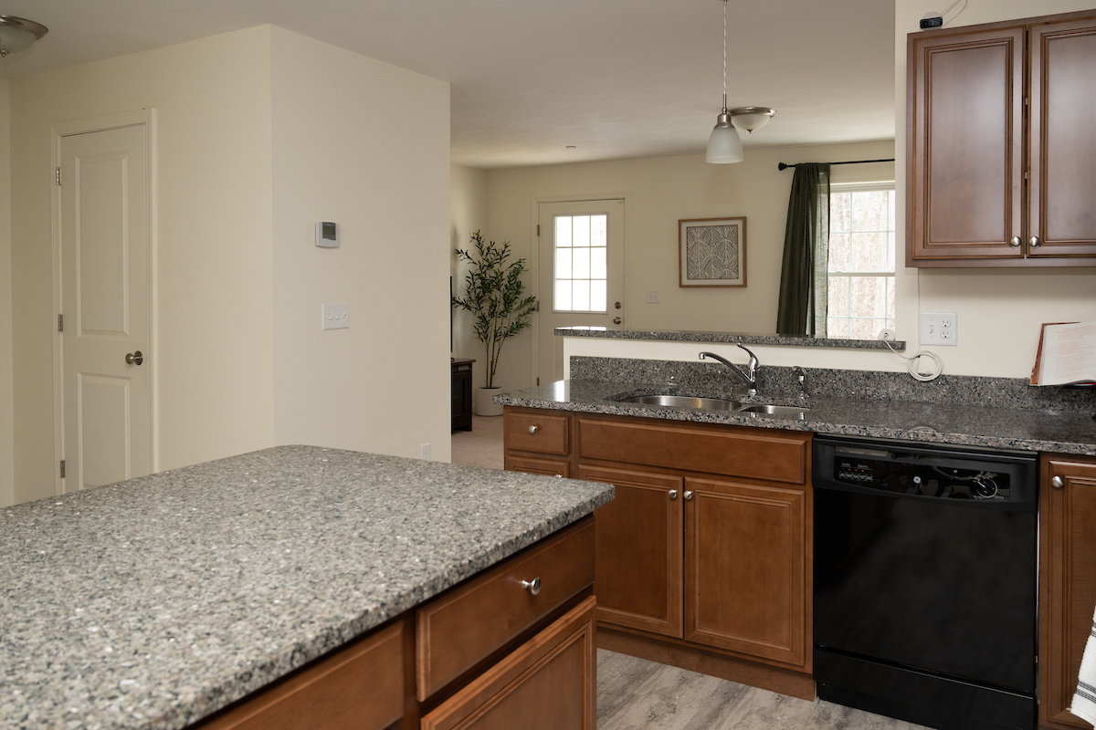 Kitchen of a 3 Bedroom Unit in the Hidden Oak Community, a high-end townhouse community by Socha Companies in Manchester NH